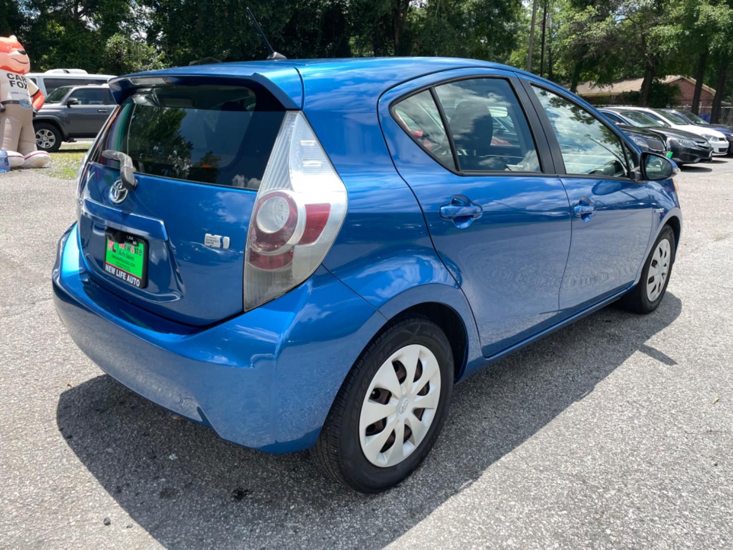 2013 BLUE TOYOTA PRIUS C ONE (JTDKDTB34D1) with an 1.5L engine, Continuously Variable transmission, located at 5103 Dorchester Rd., Charleston, SC, 29418-5607, (843) 767-1122, 36.245171, -115.228050 - Super clean interior with CD/AUX/Bluetooth, Power Windows, Power Locks, Power Mirrors, Spacious Cargo for it's size, Keyless Entry. Local Trade-in! Certified ONE Owner Vehicle!! 122k miles Located at New Life Auto Sales! 2023 WINNER for Post & Courier's Charleston's Choice Pre-owned Car Dealer AND - Photo#6